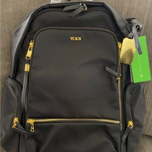 TUMI Celina Black Backpack with Gold Accents